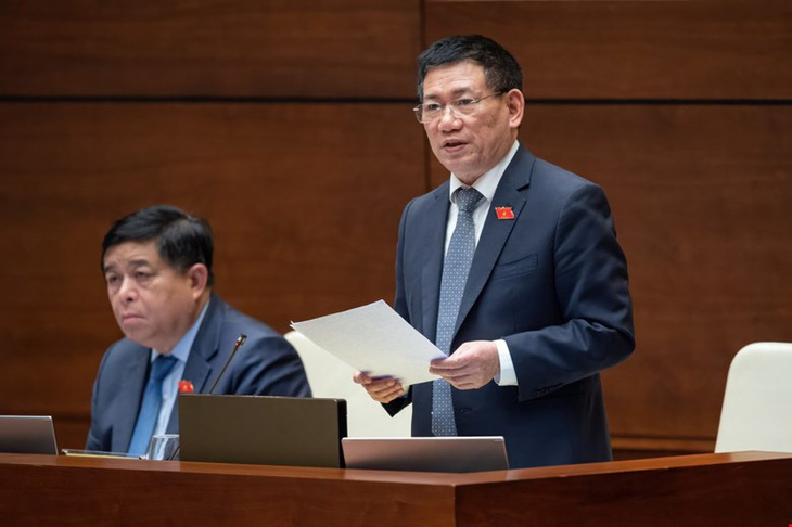 Bộ trưởng Hồ Đức Phớc thông tin về khoản tiền 1 triệu tỉ đồng ngân quỹ còn tồn gửi ngân hàng - Ảnh: Quochoi.vn